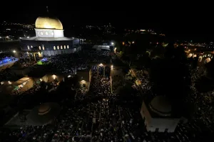 Ramadan Prints: Muslim women pray in front of the Dome of the Rock, on the compound known to Muslims as