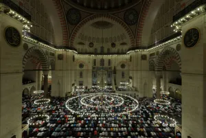Religion Prints: Muslims take part in evening prayers called Tarawih on Laylat al-Qadr or Night of