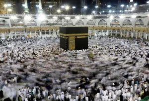 Religion Prints: Muslims gather around the Kaaba inside the Grand Mosque during the holy fasting month of