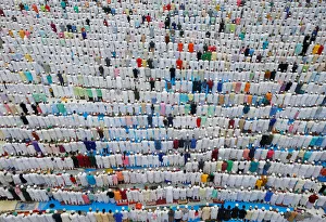 Muslims offer Eid al-Fitr prayers marking the end of the holy fasting month Ramadan