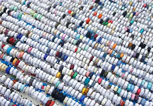 Muslims offer Eid al-Fitr prayers marking the end of the holy fasting month Ramadan