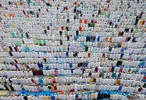 Muslims offer Eid al-Fitr prayers marking the end of the holy fasting month Ramadan
