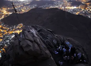 Images Dated 2016 February: Muslims pray as they visit the Hira cave at the Mount Al-Noor during their Umrah Mawlid