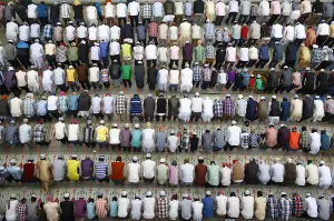 Nepali Muslims attend the mass prayer during the Eid al-Adha celebrations at the Kashmiri Nepali Muslims attend the mass prayer during the Eid al-Adha celebrations at the Kashmiri