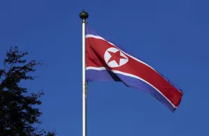 Northkorea Prints: North Korean flag flies on a mast at the Permanent Mission of North Korea in Geneva