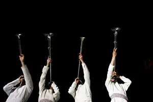 Religion Prints: Orthodox Jewish men blow trumpets during a reenactment ceremony of the Passover sacrifice