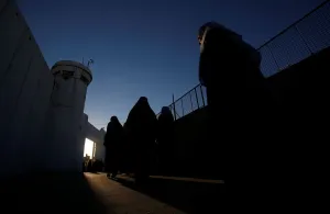 Religion Prints: Palestinians cross an Israeli checkpoint as they make their way to attend Friday prayer
