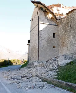 Italy Prints: A partially collapsed building is seen following an earthquake in Norcia