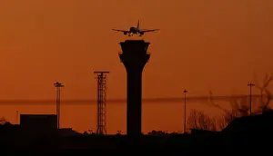 A passenger plane approaches to land at London Luton Airport, Luton