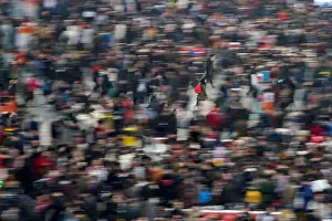 Lunar Prints: Passengers wait to board trains at Shanghais Hongqiao Railway Station as the annual