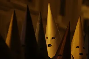 Latin America Prints: Penitents attend the Procession of the Torches during Holy Week in Cidade de Goias