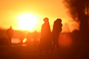Germany Prints: People enjoy the sunset at the Elbe river in Hamburg