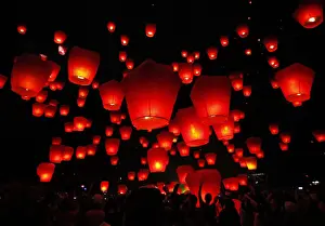 People release sky lanterns to celebrate the traditional Chinese Lantern Festival in Shifen
