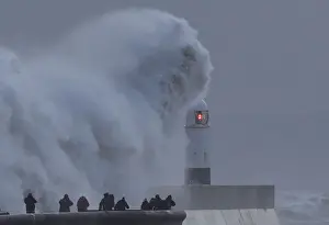 Storm Prints: People view large waves and high winds associated with Storm Eleanor as they hit