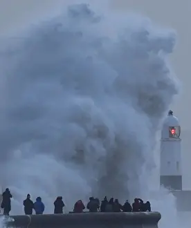 Storm Prints: People view large waves and high winds associated with Storm Eleanor as they hit