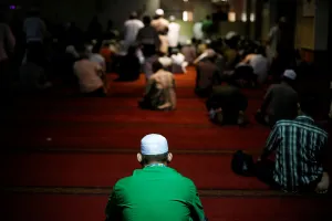 Indonesia Prints: People wait to pray at a mosque in Jakarta