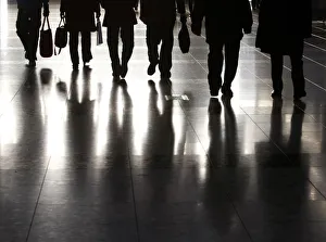People walk along a corridor of an exhibition hall in Tokyo