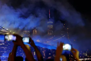 Julyfourth Prints: People watch the Macys 4th of July Firework Show over the Brooklyn Bridge in New York