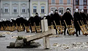 Religion Prints: People wearing masks march through the streets during Easter celebrations in Ceske