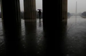 Weather Prints: A person stands at the steps of the Lincoln Memorial in Washington