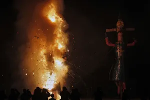 Kashmir Prints: Photographers take pictures of an effigy of Meghnad after it is set on fire during