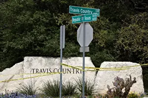 Police lines are seen blocking off part of Republic of Texas Boulevard following an