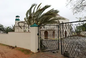 Safrica Prints: Police tape cordons off a mosque after a knife attack in Malmesbury near Cape Town