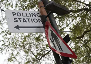 Politic Prints: A polling station sign is attached to a lamp post in central London