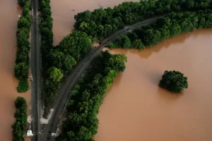 Railway lines are seen surrounded by flood waters caused by Tropical Storm Harvey near Railway lines are seen surrounded by flood waters caused by Tropical Storm Harvey near