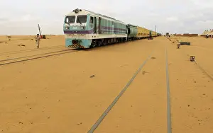 Railway tracks are covered by sand as a result of desert encroachment at Ogrein Railway
