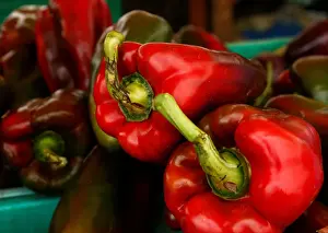 : Red peppers are displayed on a vendors stand at the Farmers Market in Ta Qali
