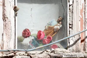 Italy Prints: A religious statue slumps to the side after an earthquake hit the island of Ischia