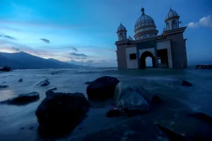 Indonesia Prints: The remains of a mosque destroyed by the earthquake and tsunami lay in Palu