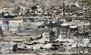 Wildfire Prints: The remains of scorched homes line a street after the Erskine Fire burned through South