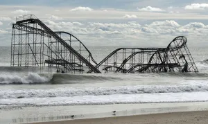 The remnants of a roller coaster sits in the surf three days after Hurricane Sandy came The remnants of a roller coaster sits in the surf three days after Hurricane Sandy came