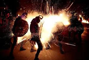 Culture Prints: Revellers dressed as devils walk among fireworks during Correfocs in Palma de Mallorca