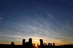 New Prints: Revellers welcome in the Summer Solstice at Stonehenge stone circle in southwest Britain