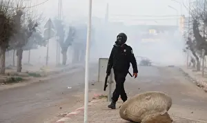 Tunisia Prints: Riot police clash with protesters during demonstrations against rising prices