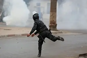 Tunisia Prints: Riot police clash with protesters during demonstrations against rising prices