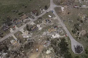 Tornado Prints: A row of houses are left flattened by a tornado in this aerial photograph taken over
