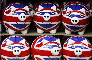 Row of piggy banks adorned with the colours of Britains Union Jack flag are seen in a