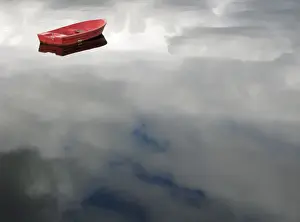 United Kingdom Prints: A rowing boat floats as clouds are reflected on Loch Linnhe in Fort William