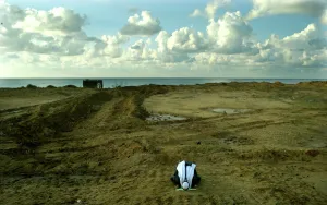 <b class=qtipBold><figcaption>Rp4Drifskqad</figcaption></b><br>A Palestinian Man Prays to Allah at a Roadside Leading to Khan Younis Along the Mediterranean Sea Near Thejewish Settlement of Netzarim. Rp4Drifskqad