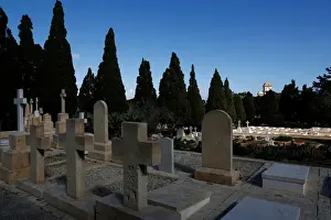 The Saint Patricks Barracks clock tower is seen from the Pembroke Military Cemetery in