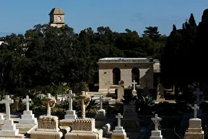 Time Prints: The Saint Patricks Barracks clock tower is seen from the Pembroke Military Cemetery in