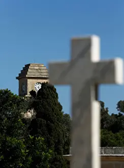 The Saint Patricks Barracks clock tower is seen from the Pembroke Military Cemetery in