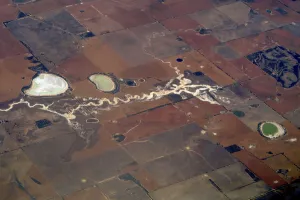 Climatechange Prints: Salt lakes can be seen near a river and small dams in a drought-affected farmland area