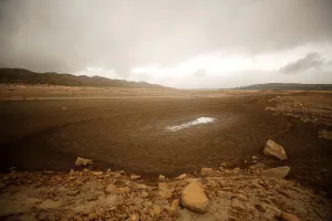 Safrica Prints: Sand blows across a normally submerged area at Theewaterskloof Dam near Cape Town