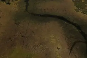 The shadow of a small aircraft is seen as water begins to fill the Okavango Delta
