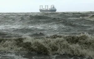 Storm Prints: A ship is seen from the shore of the Bay of Bengal before cyclone Mahasen approaches in